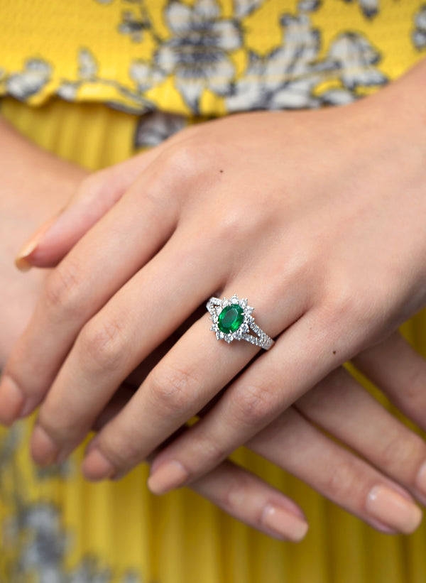 1.17 Carats Oval Cut Emerald & Diamond Halo Floral Engagement Ring in White Gold