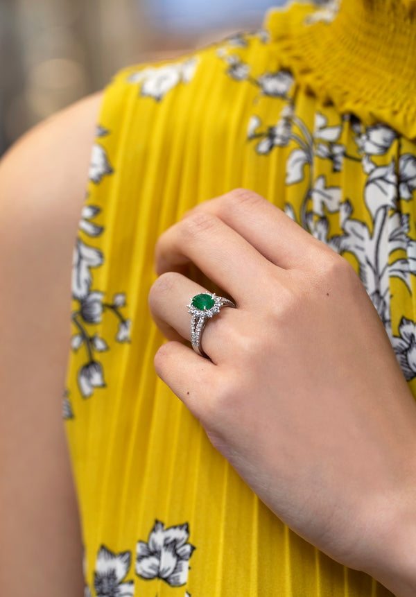 1.17 Carats Oval Cut Emerald & Diamond Halo Floral Engagement Ring in White Gold