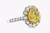 GIA Certified 4.47 Carats Round Brilliant Cut Yellow Diamond Engagement Ring in Yellow Gold & Platinum