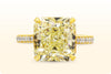 GIA Certified 8.07 Carat Radiant Cut Fancy Yellow Diamond Pave Engagement Ring in Platinum