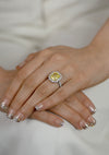 GIA Certified 5.66 Carat Radiant Cut Fancy Yellow Diamond Halo Engagement Ring in Platinum