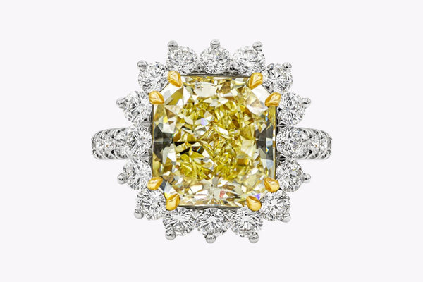 GIA Certified 5.66 Carats Radiant Cut Yellow Diamond Halo Engagement Ring in Platinum