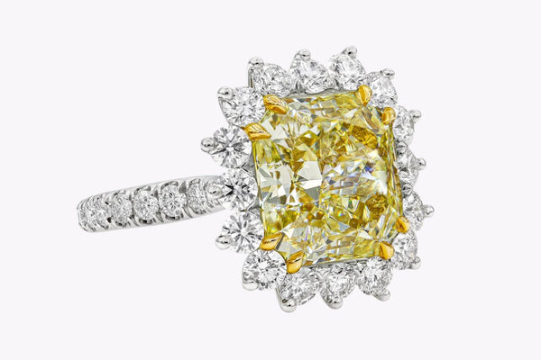 GIA Certified 5.66 Carats Radiant Cut Yellow Diamond Halo Engagement Ring in Platinum