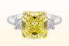 GIA Certified 3.64 Carats Radiant Cut Fancy Intense Yellow Diamond Three-Stone Engagement Ring in Yellow Gold and Platinum