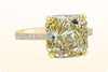 GIA Certified 6.54 Carat Radiant Cut Fancy Yellow Diamond Pave Engagement Ring in Yellow Gold
