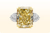 GIA Certified 17.25 Carat Radiant Cut Fancy Intense Yellow Diamond Three-Stone Engagement Ring in Platinum