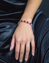 31.02 Carats Total Alternating Cushion Cut Burmese Ruby and White Diamond Tennis Bracelet in Two Tone