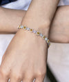 6.94 Carat Total Cushion Cut Fancy Yellow Diamond Halo Bracelet in Two-Tone Gold