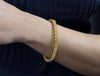 35.49 Carats Total Cushion Cut Fancy Yellow Diamond Tennis Bracelet in Yellow Gold