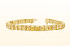 35.49 Carats Total Cushion Cut Fancy Yellow Diamond Tennis Bracelet in Yellow Gold