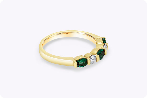 Elegant 0.51 carat green emerald and diamond five stone ring