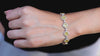 9.29 Carat Total Cushion Cut Fancy Color Yellow Diamond Halo Bracelet in Two Tone Gold