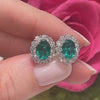 2.18 Carats Total Oval Cut Green Emerald and Diamond Halo Stud Earrings in White Gold